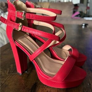 Women’s red heels 
size 5